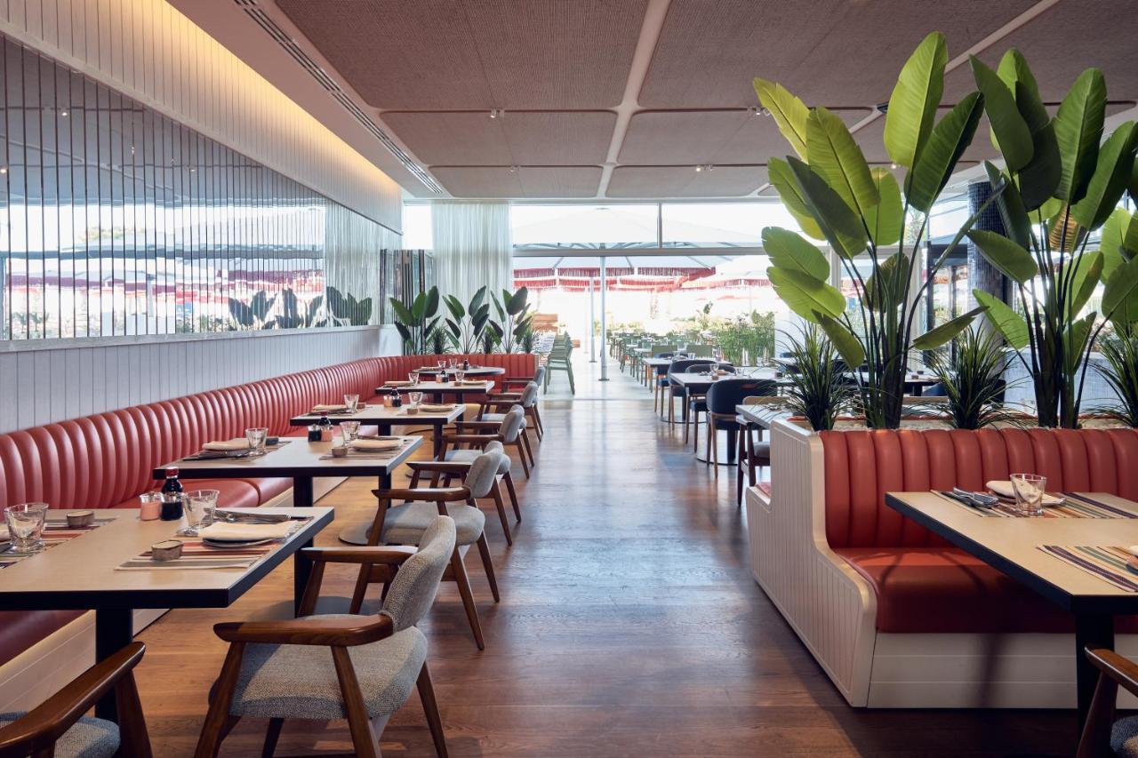 Falkensteiner Hotel & Spa Jesolo Esterno foto Restaurant interior