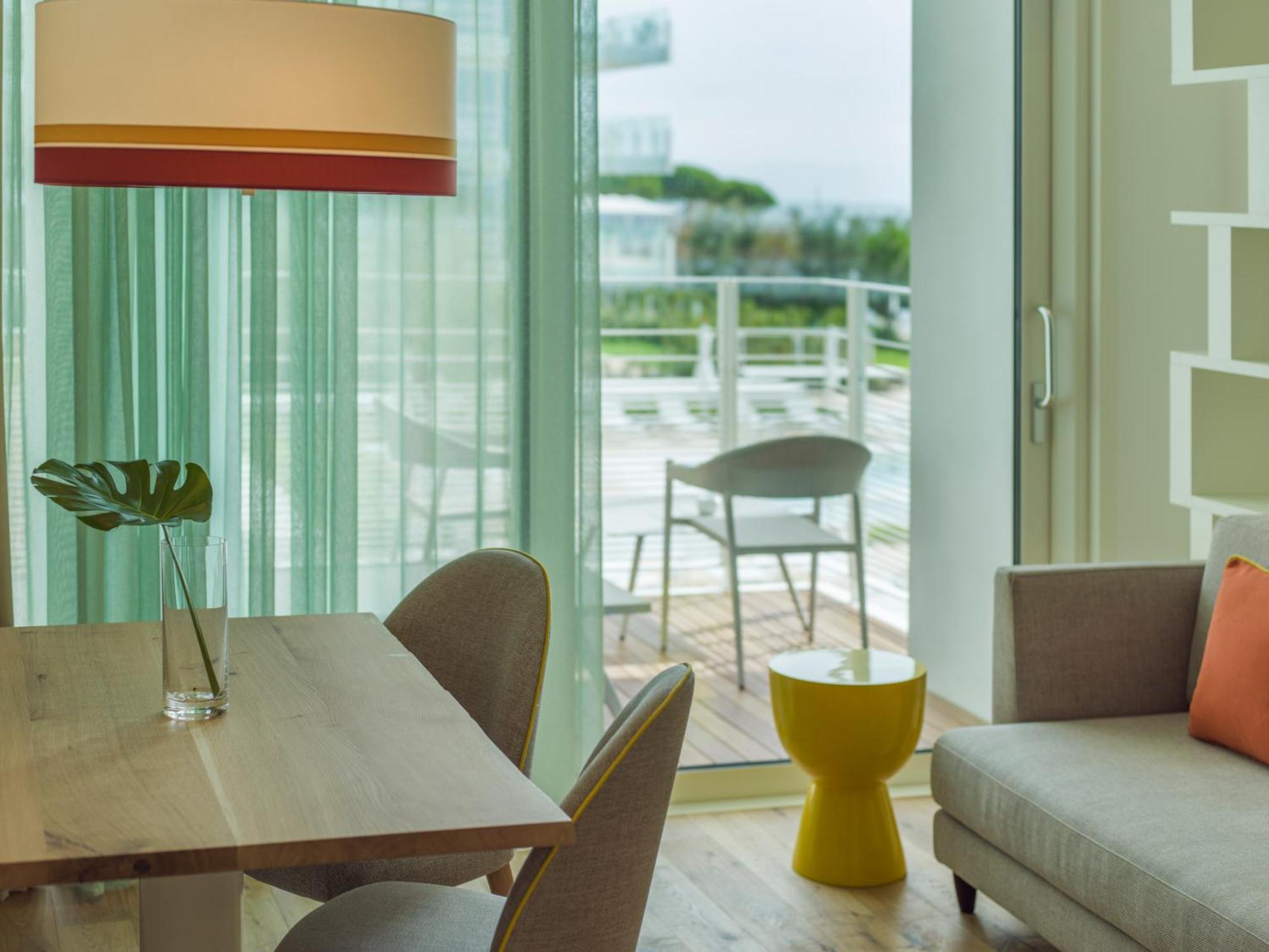 Falkensteiner Hotel & Spa Jesolo Camera foto A living room at the W South Beach
