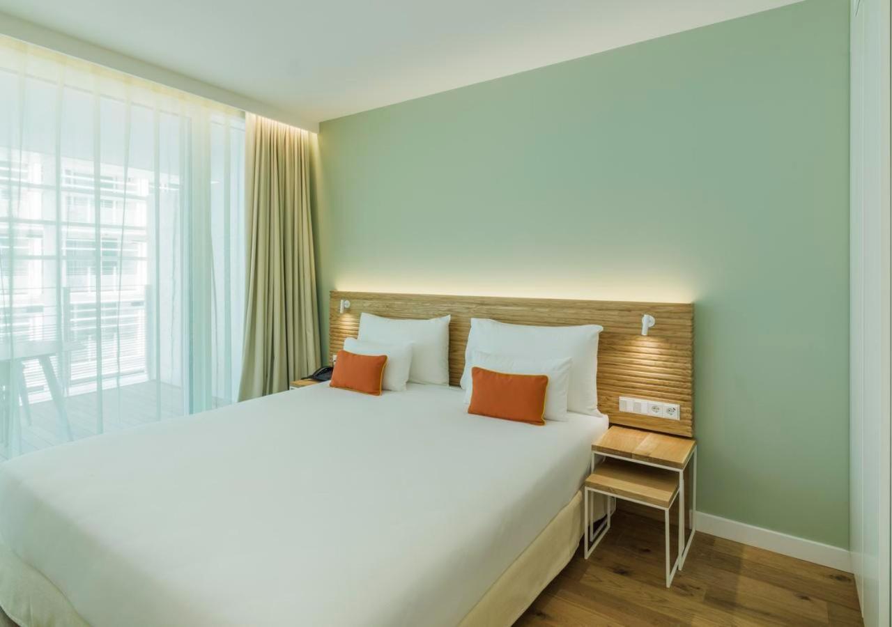 Falkensteiner Hotel & Spa Jesolo Camera foto A room at the hotel