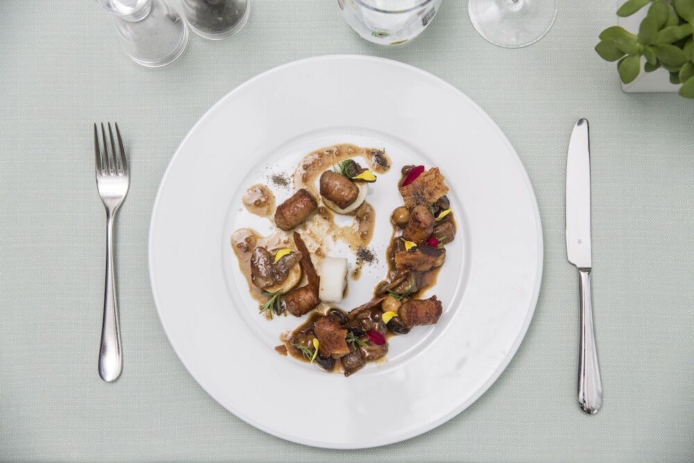 Falkensteiner Hotel & Spa Jesolo Esterno foto A plate of food