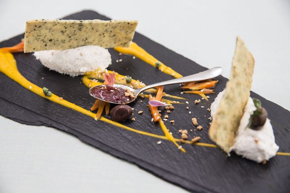 Falkensteiner Hotel & Spa Jesolo Esterno foto A cheese platter
